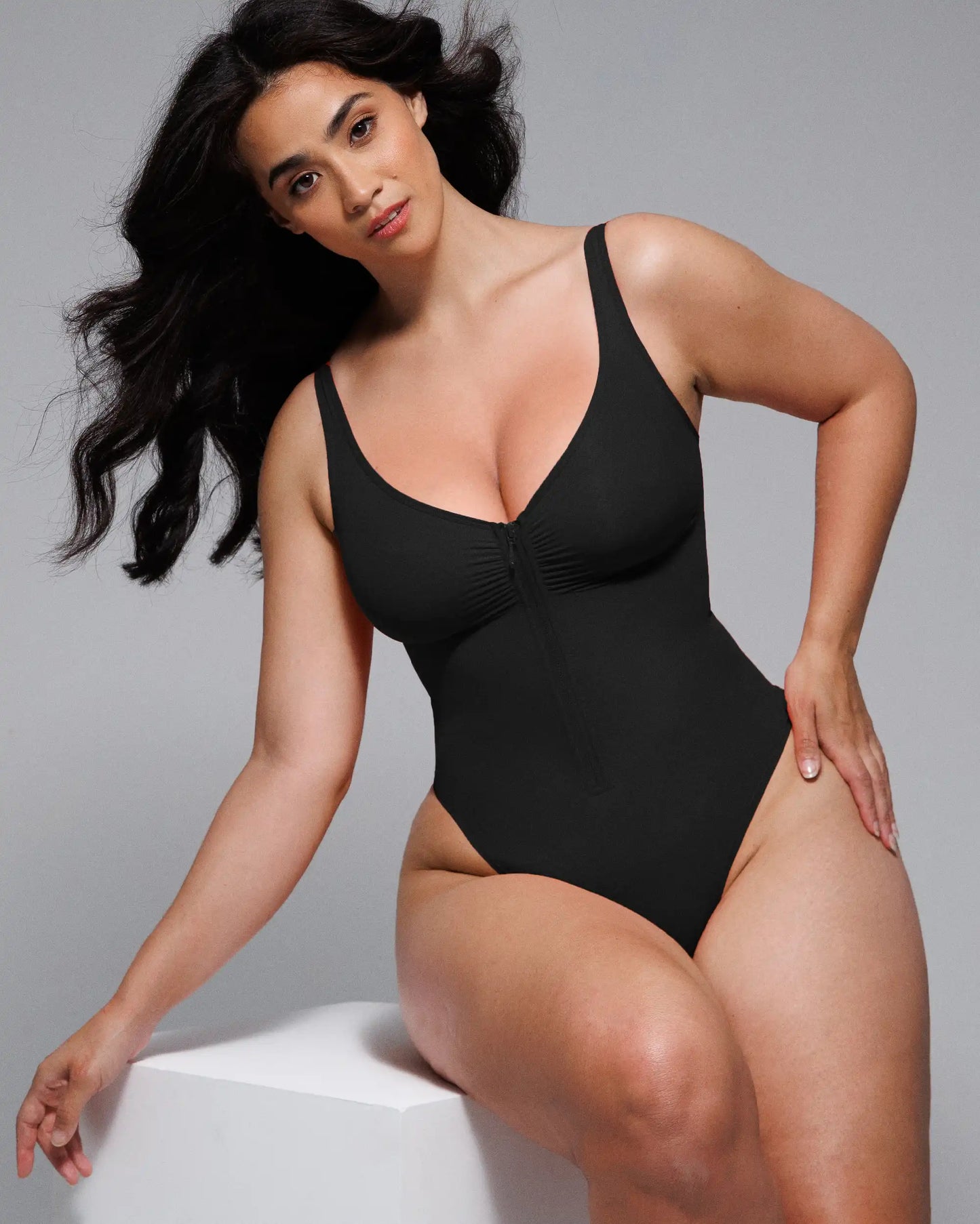 Bare Essentials™ Skin Flow™ Zipper Front Thong Bodysuit